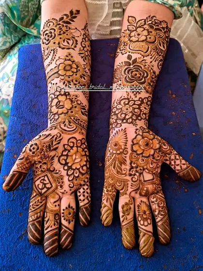 A lovely floral design with delicate shading, giving the flowers a soft, almost painted look on the skin.