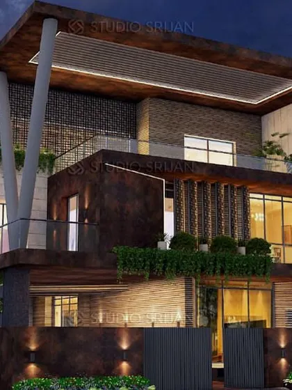 A night view of the Varanasi residence, where architectural lighting highlights the textures of the materials and the dramatic forms of the building.