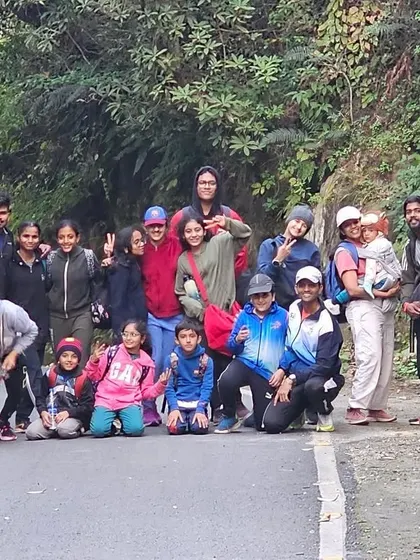 The whole team together on a mountain road during our high-altitude training. These shared experiences in challenging environments create an unbreakable team bond.