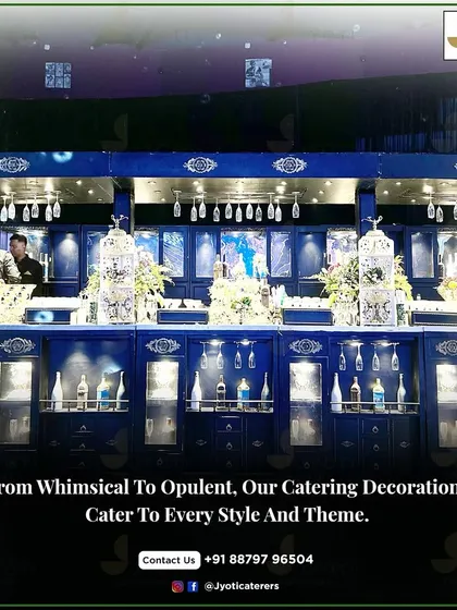 A magnificent royal blue bar setup, featuring intricate white birdcage decor and elegant floral arrangements, ready to serve a wide array of beverages.