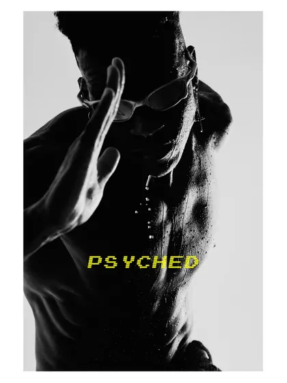 A high-contrast, graphic male portrait. The harsh sunlight and water droplets create a powerful, athletic image that's been converted to black and white for maximum impact.