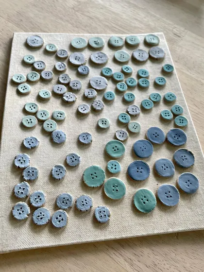 This is a story about a custom commission for ceramic buttons. A client needed unique, handmade buttons for a hand-stitched outfit, and we worked together to create 66 custom pieces in various sizes and colors.
