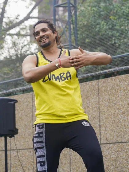 Me leading an outdoor Zumba session. It's all about fitness, fun, and feeling the rhythm, whether we are in the studio or outside.