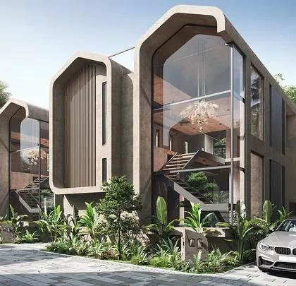 These Vagator Villas, currently under construction, represent a new typology of homes with soft edges and earthy finishes. The curved forms and large glass openings are designed to blend seamlessly with the Goan outdoors.