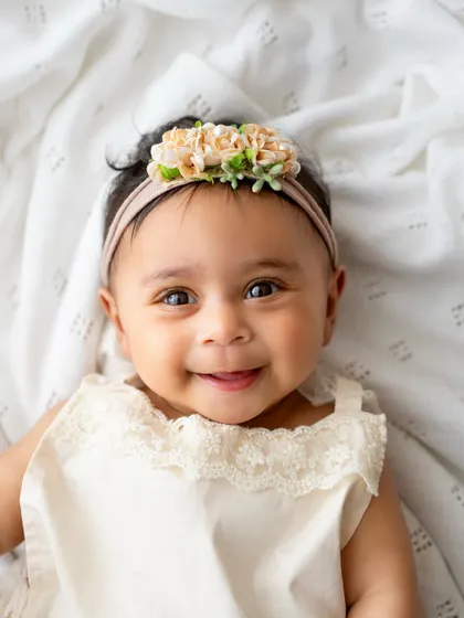 Those big, bright eyes and that sweet smile are what 6-month sessions are all about. I love capturing these simple, beautiful portraits.