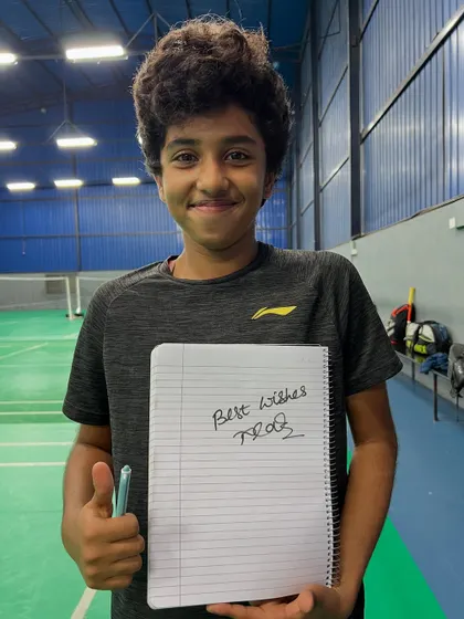 A young player proudly shows off an autograph from Prakash Padukone after the inauguration of our new High-Performance Centre in JP Nagar.
