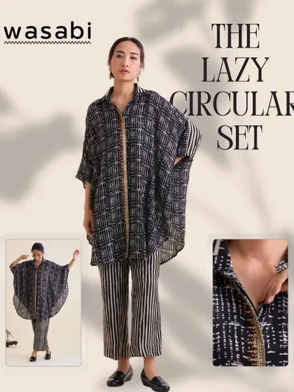 I call this The Lazy Circular Set, for days when you want to feel put-together without trying too hard. It’s crafted in soft cotton silk and pairs an oversized, double-collared shirt with relaxed striped pants. The intricate hand embroidery adds that special touch of artistry.