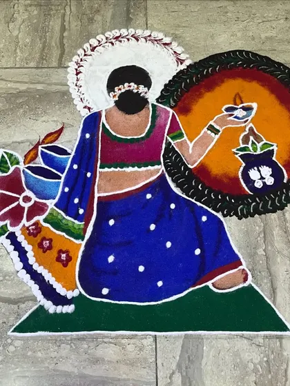 A figurative rangoli showing a woman in a traditional saree holding a diya. This type of artistic floor decor is perfect for adding a touch of grace and custom artistry to a festive event at home or a venue.