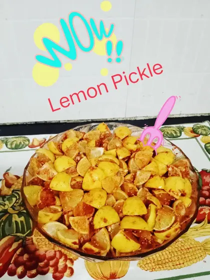 A big batch of our lemon pickle getting ready. My mom makes sure every piece is coated in masala before it goes into the jar for sun-drying.