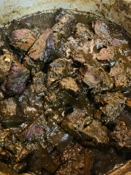 This is my smoked pork prepared with Aneshi, which are dried yam leaves. The dark, rich gravy comes from the Aneshi, bamboo shoot juice, and a blend of king chillies and mingchinga seeds.