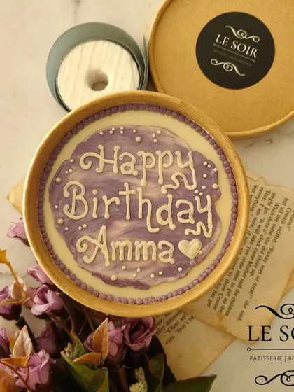 A lovely purple watercolor-effect cake tub for Amma's birthday. The custom lettering and simple design make it an elegant and personal gift.