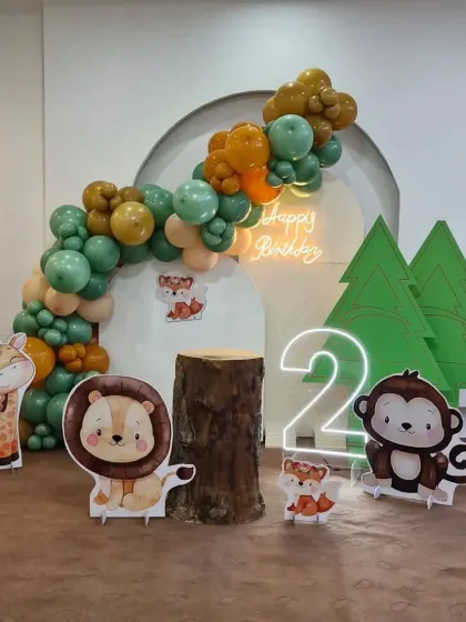 This wide shot shows the complete modern jungle setup, perfect for an indoor space. The layout is designed for great photos and easy interaction.