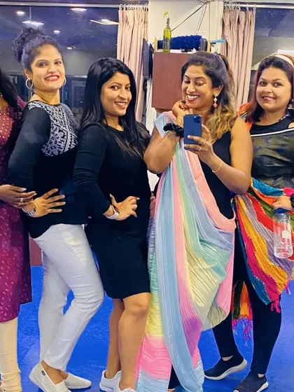 Posing for a selfie during the Women's Day celebration. It's all about fun, friendship, and feeling good together.