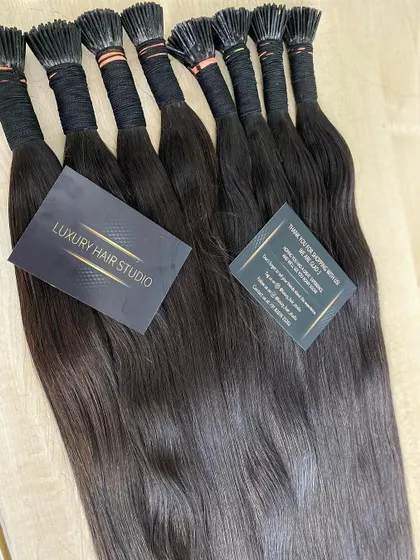 Our I-Tip extensions come professionally packaged with our branding, assuring you of their quality. This is a set of dark brown extensions ready for shipment.