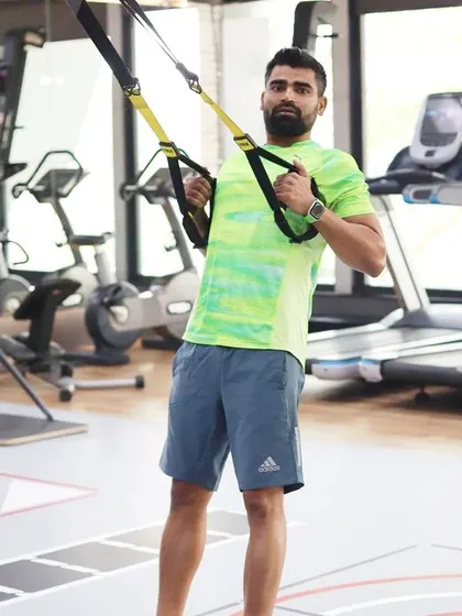 The real workout starts when you want to stop. Using tools like the TRX suspension trainer, I constantly challenge myself to push past my limits.