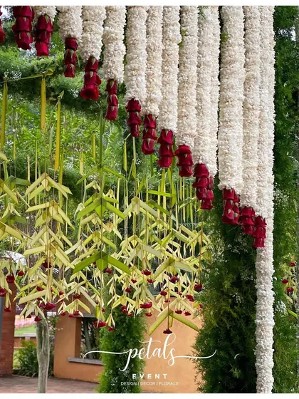 A close-up of the beautiful floral arrangements on the entrance arch.