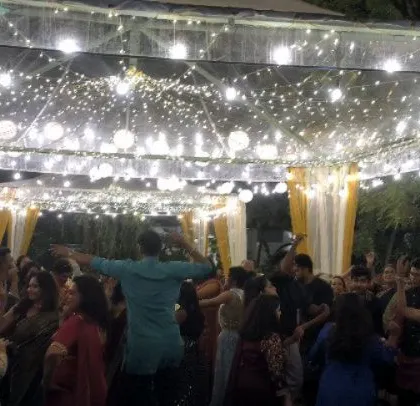 A moment of group dancing, showing the unity and fun of the celebration.