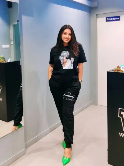 A customer looking stylish in a custom printed co-ord set. I can print on both the t-shirt and the joggers for a complete look.