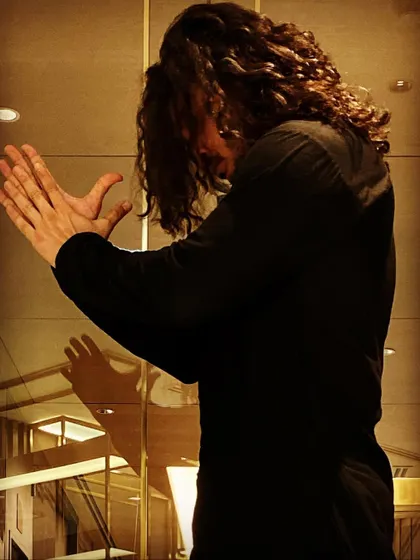 Behind the scenes in the green room before a show. A moment for warm-ups, reflection, and maybe trying to master the art of taking a good selfie.