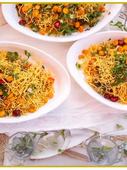 The iconic taste of Mumbai street food, perfected for your event. Our Sev Puri is a burst of tangy, spicy, and crunchy flavors, beautifully presented in white bowls.