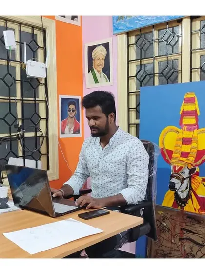 A candid shot of me working in my studio. I'm passionate about creating unique and meaningful art for my clients.