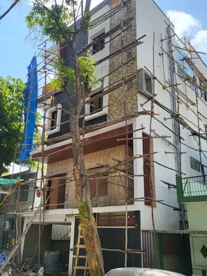 Another photo of the elevation work, capturing the process from a different angle.