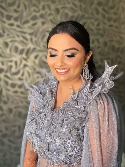 A close-up of the silver and black smokey eye, which is blended to perfection for a sultry, captivating effect.