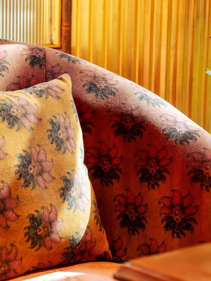 A close-up of our plush, custom-upholstered seating. Even the fabric patterns are chosen to enhance the feeling of royal comfort and artistry.