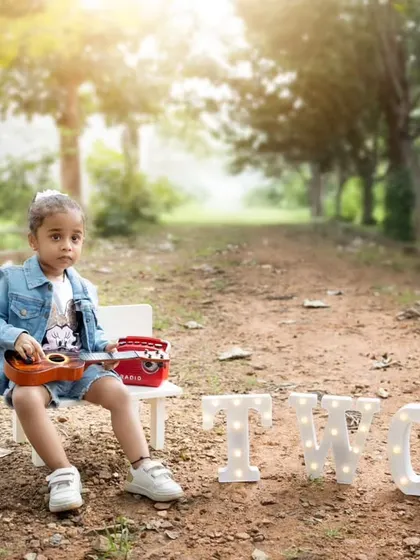 A wide shot of the two-year-old's outdoor birthday setup, showing the beautiful, natural surroundings.