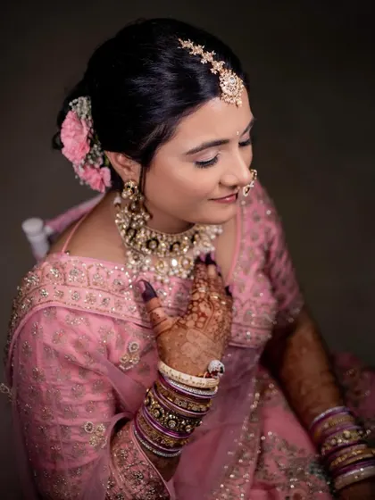 A closer look at this bride's soft pink wedding makeup. The look is simple, elegant, and lets her natural beauty shine through.