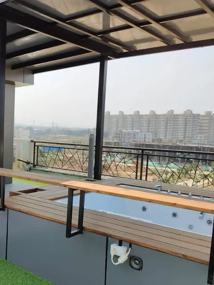 A bar-style counter was added to the side of the jacuzzi deck, creating a perfect spot for drinks with a view.