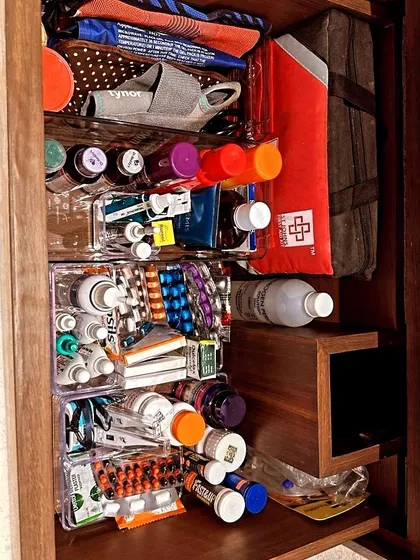 A well-organized medicine cabinet is crucial for safety and peace of mind. Using clear, divided organizers helps you see everything and find what you need in an emergency.