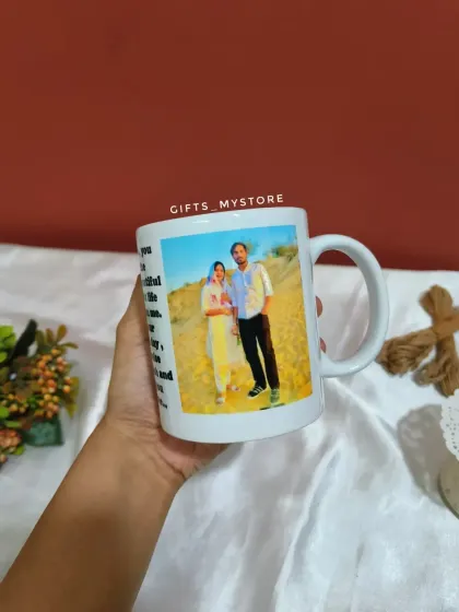 The custom photo mug, featuring a picture of the couple and a heartfelt message on the other side.