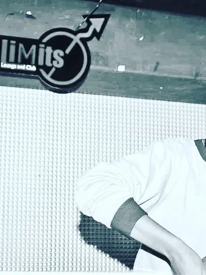 A black and white shot from a night at NoLimits Lounge and Club. This captures the focused, classic vibe of spinning records in a dedicated music venue.