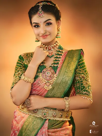 A smiling bride is the best canvas. Here, we focused on a soft, glowing makeup look that enhances her natural beauty for her special day.