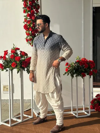 A side profile showing the full ethnic look. I believe in dressing well for every occasion, setting the tone for a high-class wedding event.