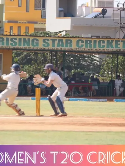 A stumping attempt by the wicketkeeper during a fast-paced T20 match.