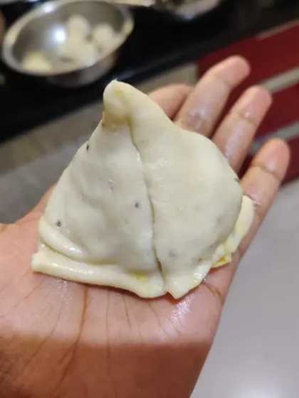 Each samosa is shaped by hand to ensure a perfect, crisp pocket for the delicious filling.