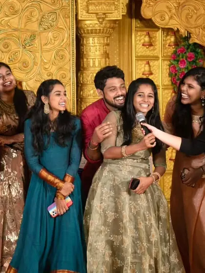 Laughter and joy on stage with the bride's closest friends. We specialize in creating a fun, casual atmosphere where friends can celebrate and create lasting memories.