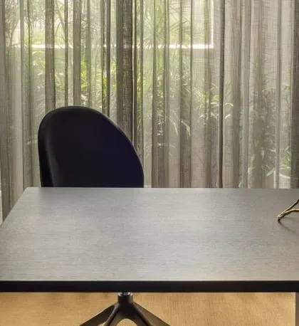A detail shot of an office space, showing how we use natural daylight to create a healthy and productive work environment.