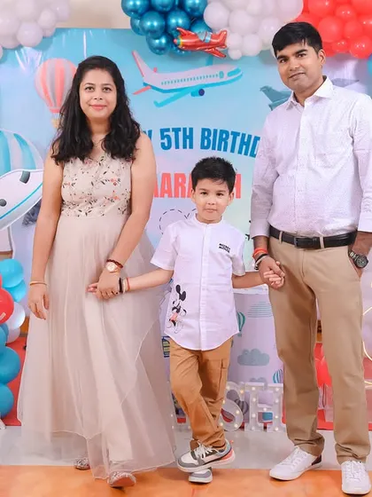 A sweet 'Donut Grow Up' themed first birthday party, featuring playful donut and cupcake props, a colorful backdrop, and a light-up number '1', perfect for a fun and memorable celebration.