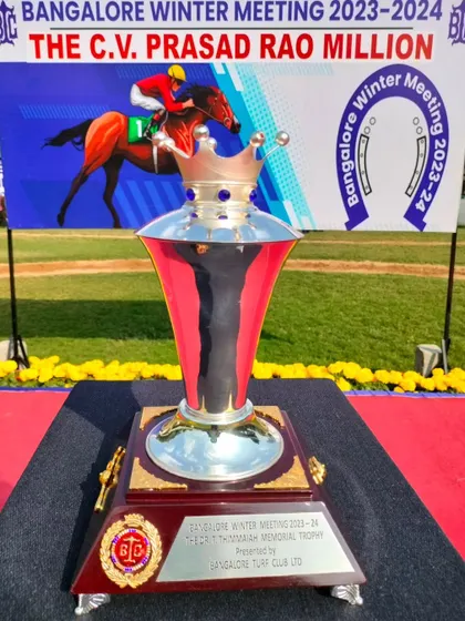The Dr. T. Thimmaiah Memorial Cup, a beautiful crowned silver trophy.