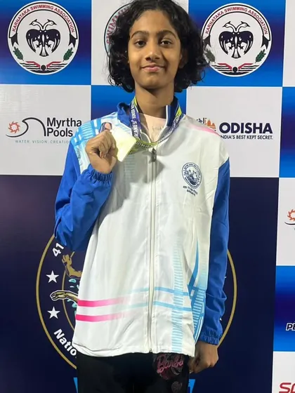 Shwiti Diwakar Suvarna with her individual gold in the 100m Butterfly.