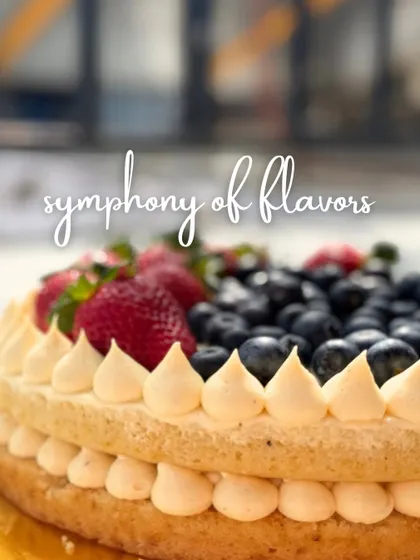 A symphony of flavors in this beautiful berry tart. A crisp pastry shell is layered with cream and topped with an abundance of fresh strawberries and blueberries for a vibrant finish.