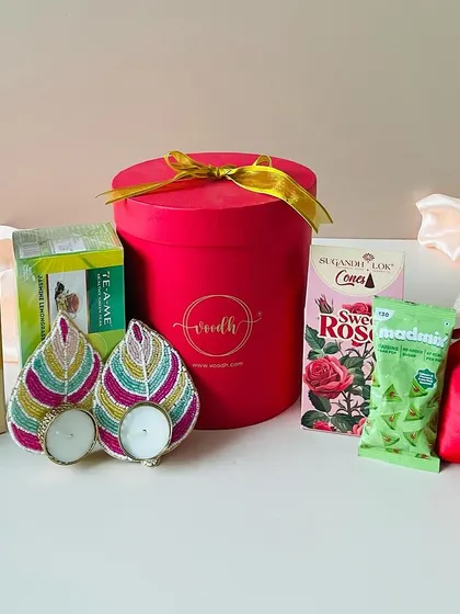 Another shot of the round box hamper, showing the variety of items we can curate for a delightful and affordable gift.