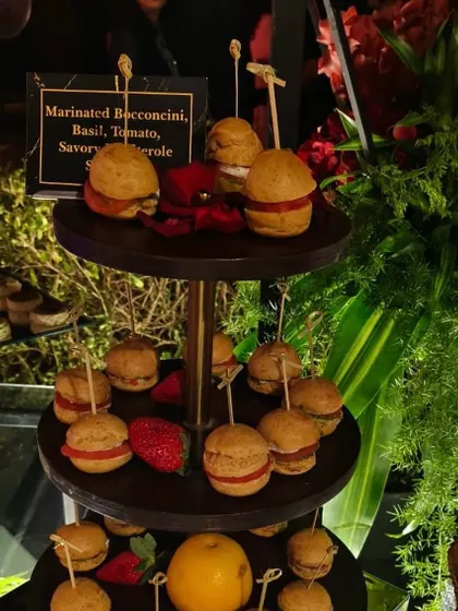 Bite-sized savory profiteroles filled with marinated bocconcini, basil, and tomato. These are a perfect pass-around appetizer for a sophisticated cocktail hour or high-tea.