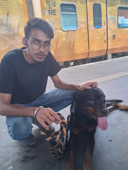 Giving this Rottweiler some reassurance on the platform in Delhi before we boarded the train to Banaras.
