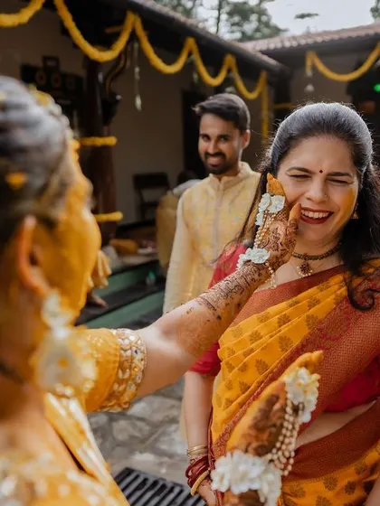 The sheer joy and messiness of a Haldi ceremony. We love capturing the candid reactions as friends and family shower the couple with love and turmeric.