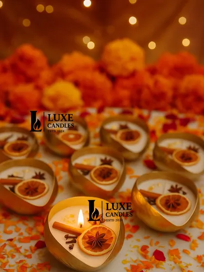 These boat-shaped urli candles are infused with the warm aroma of cinnamon and spices. They make for a unique and fragrant Diwali favor.