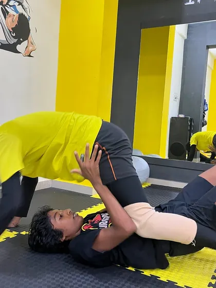 Two students drilling a guard pass. Repetition is key to mastering any technique in jiu-jitsu.